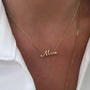 14K yellow gold Mrs. Diamond Accent Nameplate Necklace On Models neck - Camille Jewelry